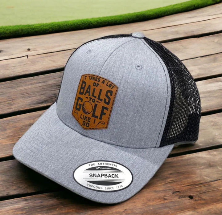 It Takes A Lot To Golf Leather Patch SnapBack Hat